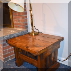 F63. Wood side table. 17”h x 22” x 23” - $48